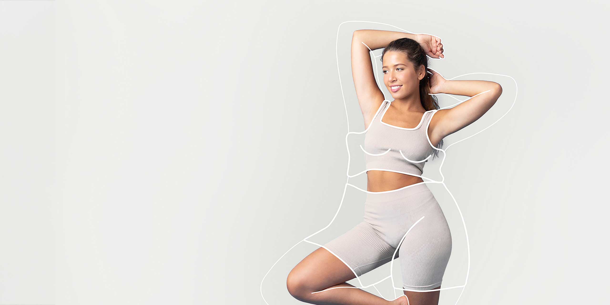 Junge Frau in Fitnessoutfit mit aufgezeichneten Konturen um den Körper